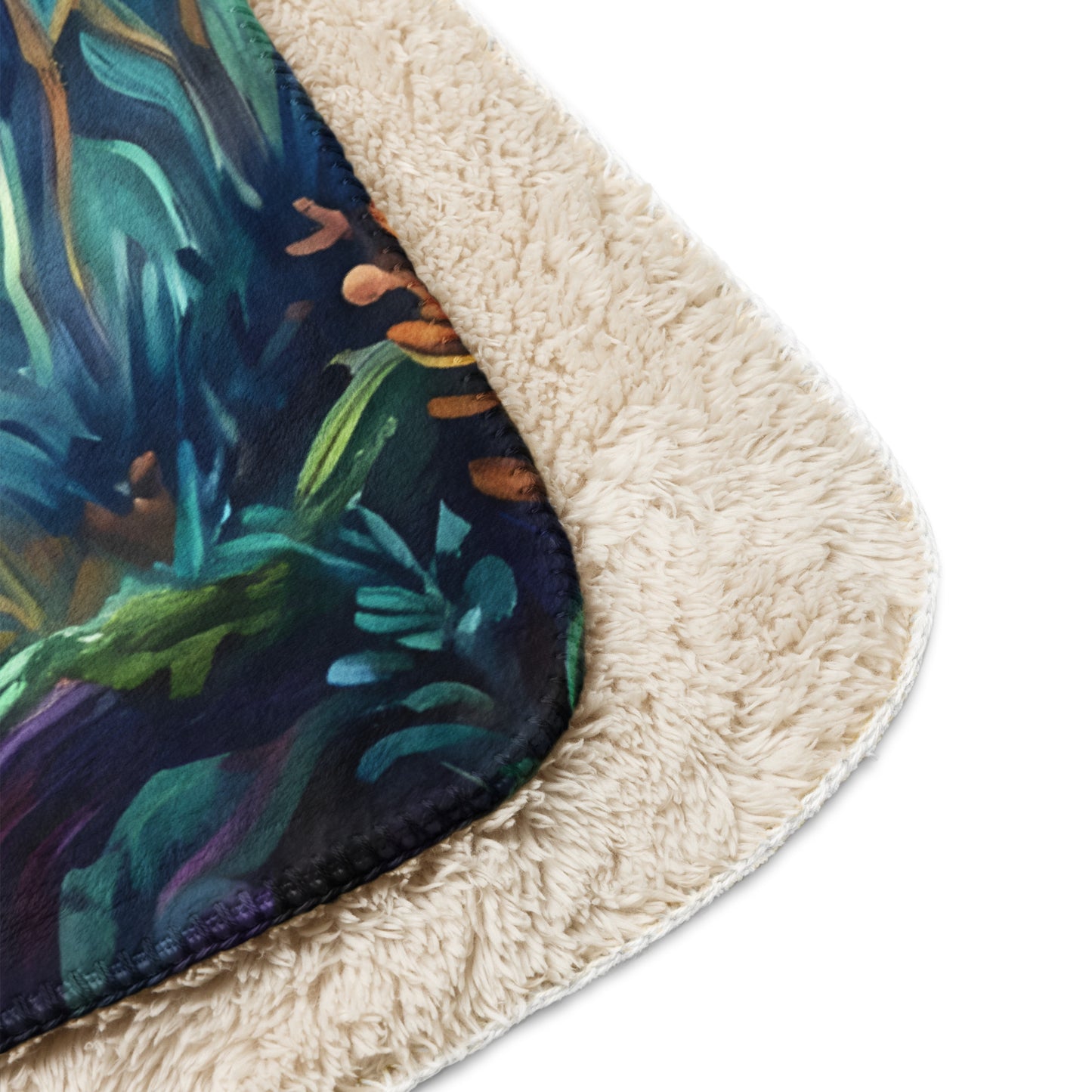 Spirit Wolfpack Sherpa Blanket detail shot — close-up of blanket corner showing spirit wolf pack moonlit forest print on front with teal green and orange wildflower accents and plush cream sherpa texture on reverse on white background