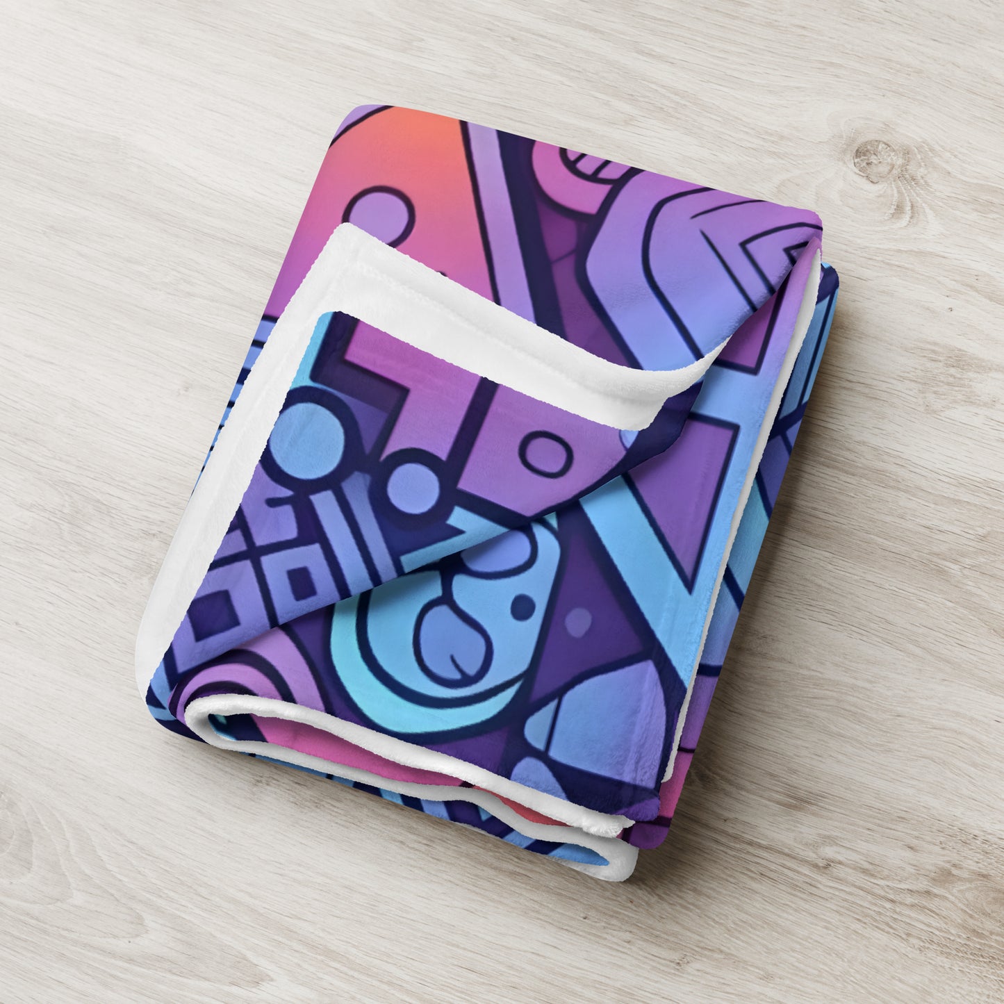Geometric Synthwave 50x60 throw blanket lifestyle shot — blanket folded and stacked showing pattern detail