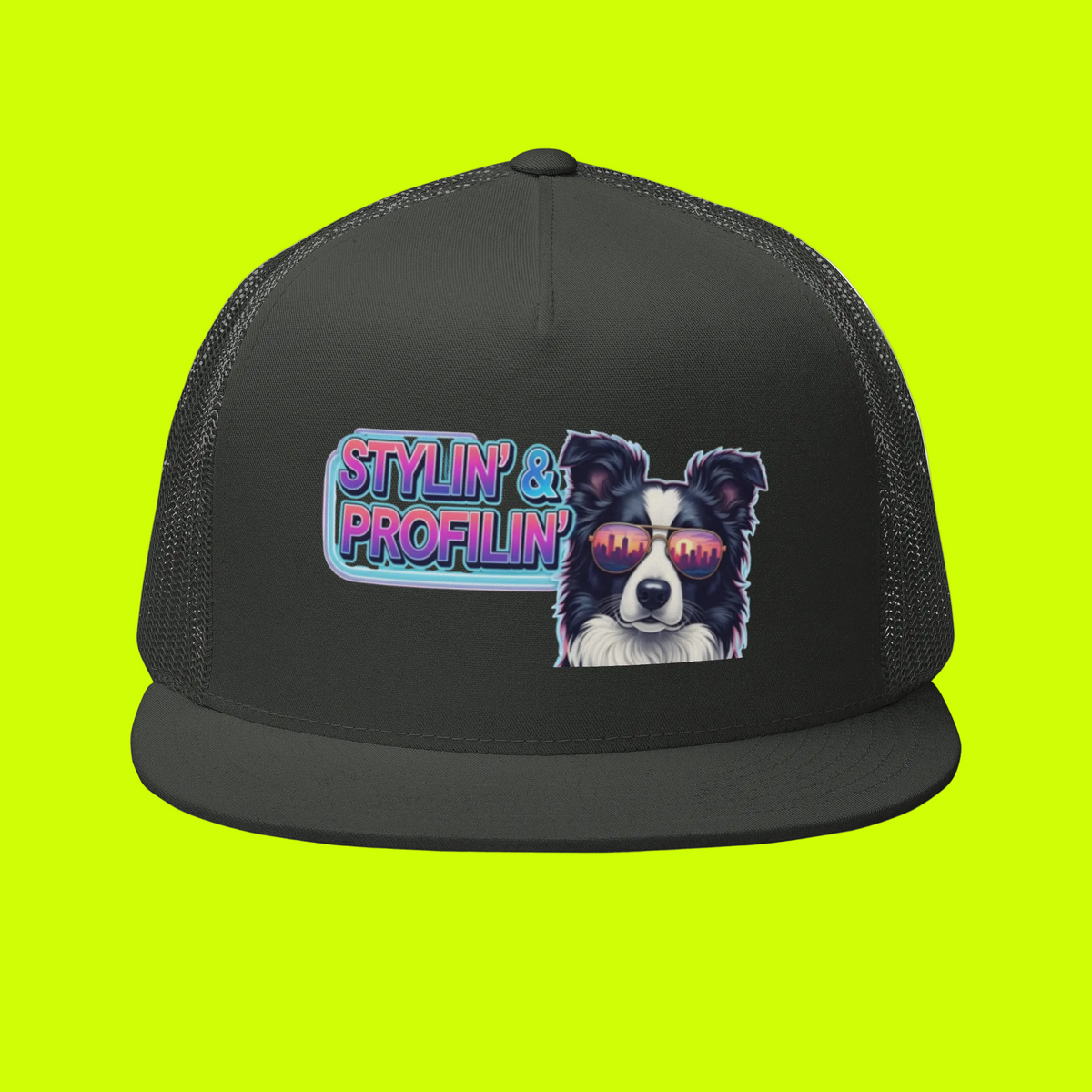 Stylin' Trucker Cap front view — Scout border collie with neon Stylin' & Profilin' logo patch on charcoal crown with charcoal mesh back on neon yellow-green background