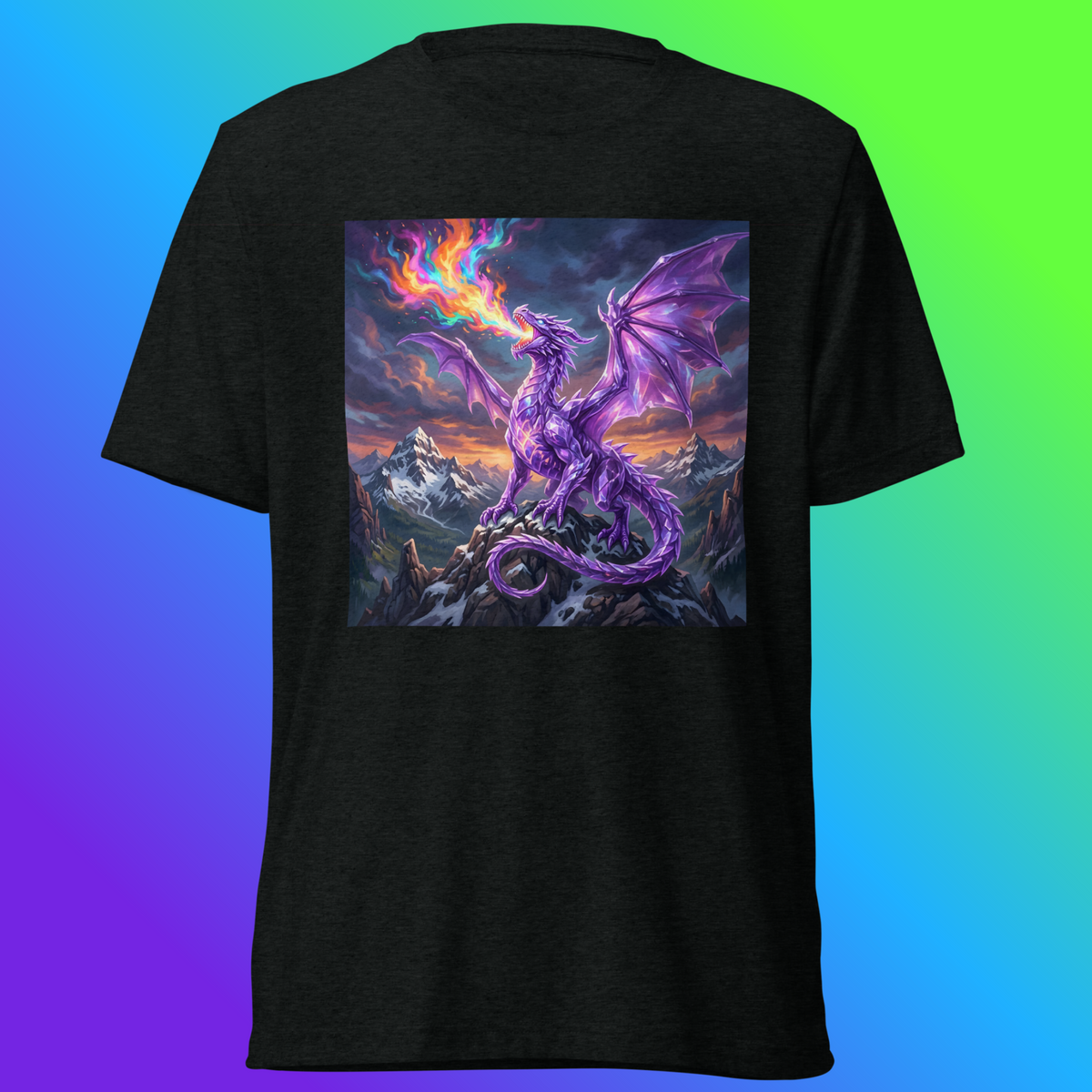 Black Amethyst Ascendant Dragon Tee featuring a purple dragon breathing rainbow fire atop a rocky mountain peak, against a blue-and-green gradient background.
