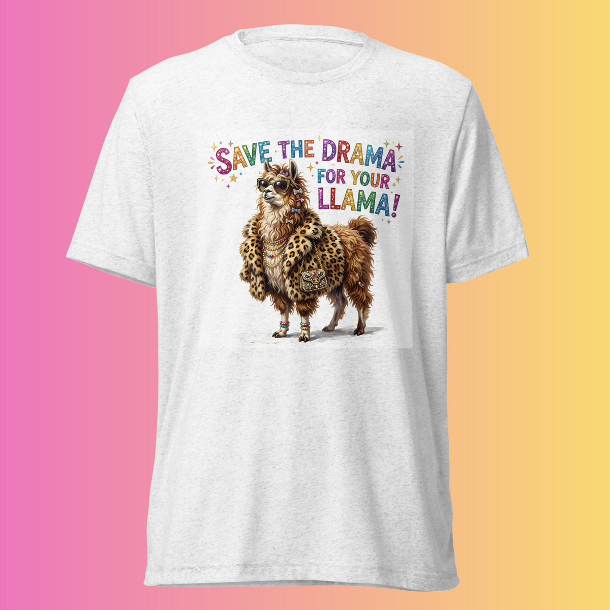 White Drama Llama T-shirt featuring a llama in sunglasses and a leopard-print jacket with “Save the drama for your llama!” lettering on a pink-and-yellow background.