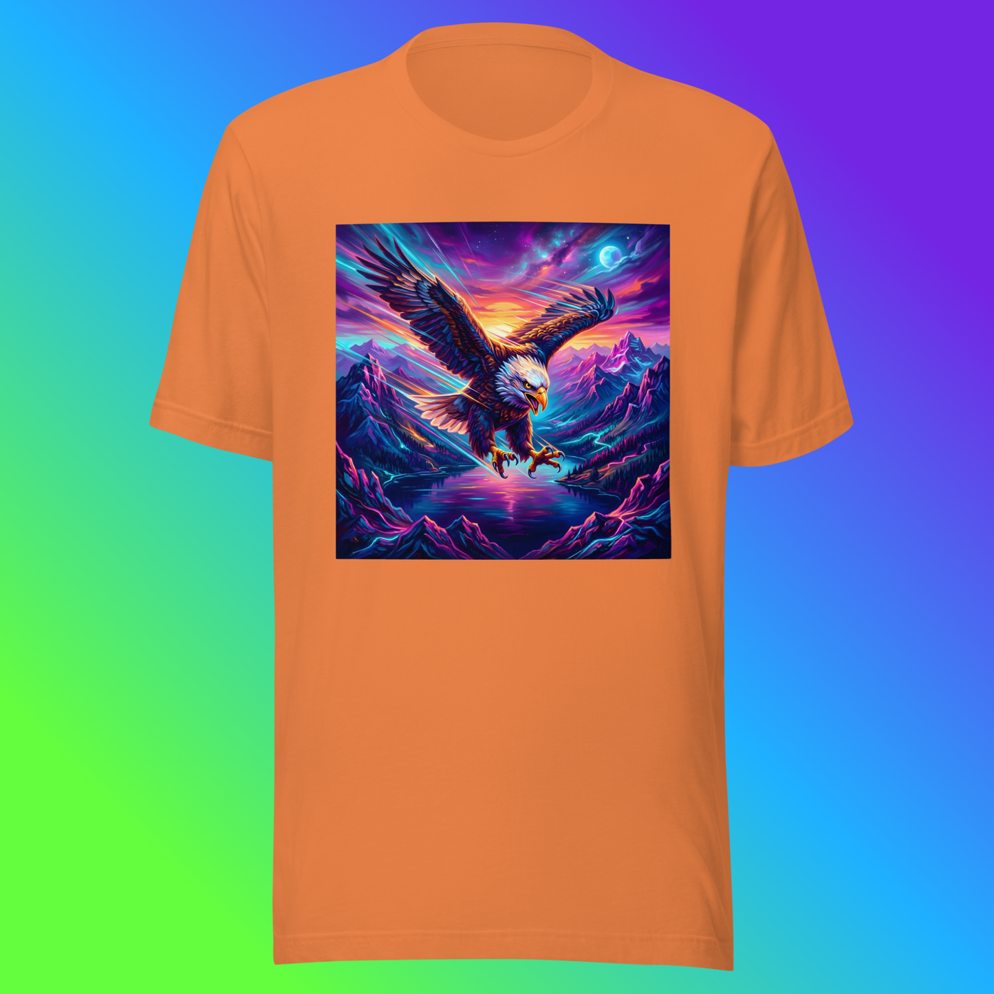 Elegant Eagle Unisex T-Shirt product shot — burnt orange tee with bald eagle diving over neon purple mountain range with glowing blue moon and neon orange sunset sky on green, blue, and purple gradient background