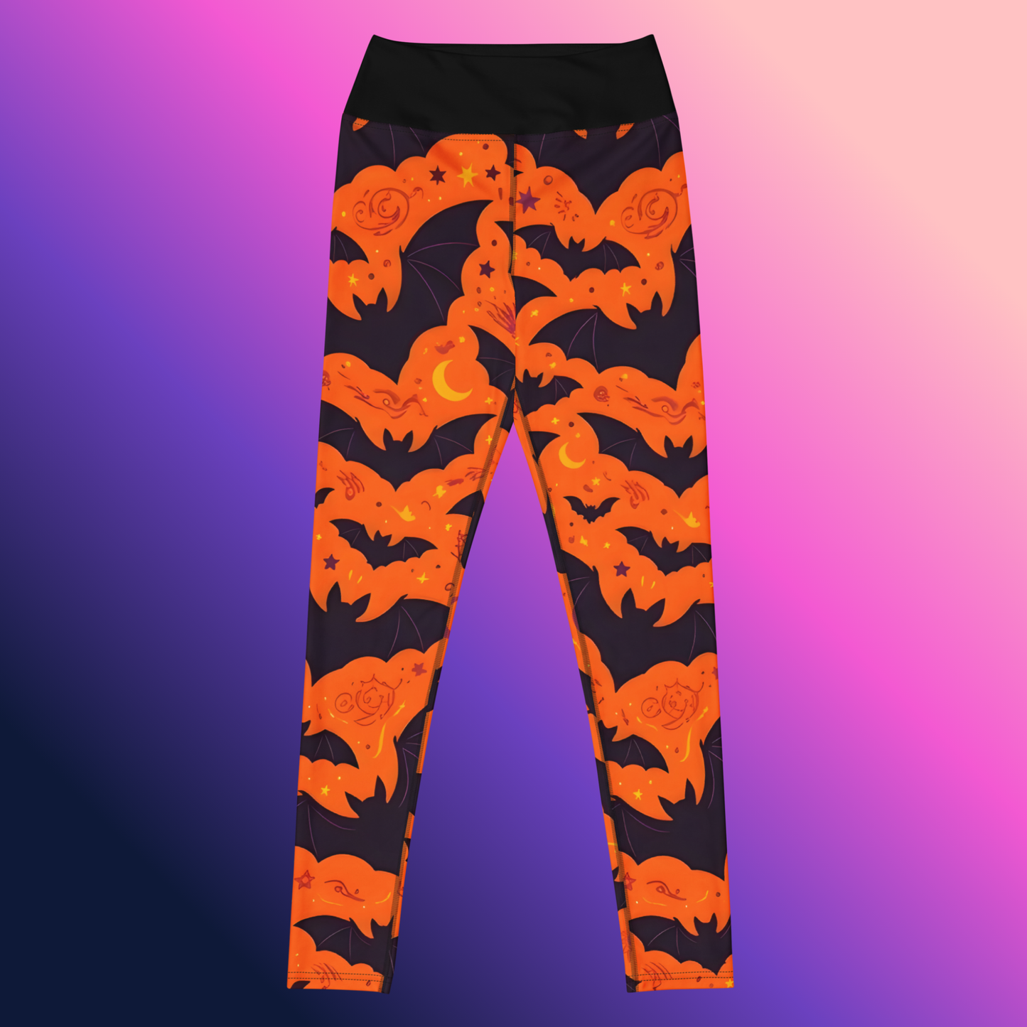 Fright Night Yoga Leggings product shot — back flat lay showing full all-over print of orange Halloween bats flying through dark navy clouds with crescent moon stars and spider web details and black high-waist band against purple to pink gradient background