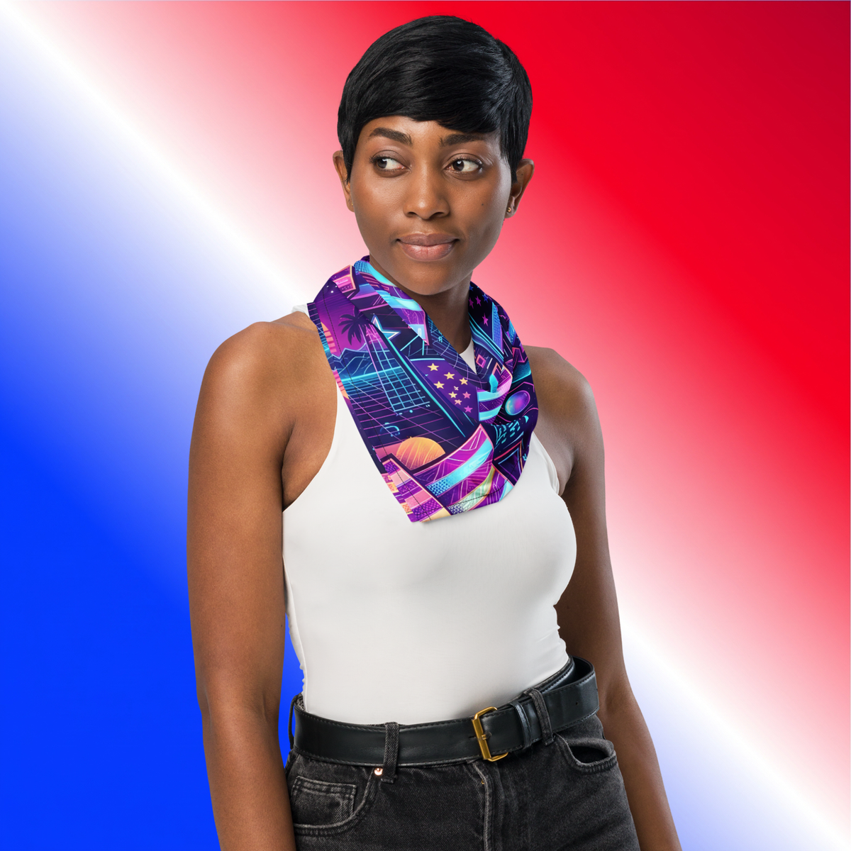 Neon Nation Bandana large lifestyle shot — Black female model with short hair in white tank top and black jeans wearing neon synthwave American flag bandana as neck scarf against red white and blue gradient background