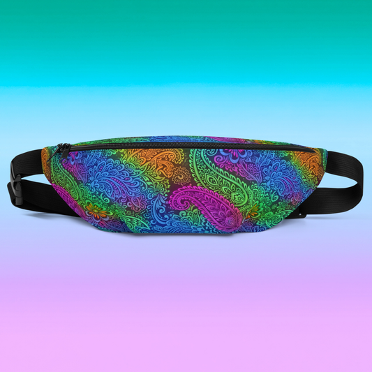 Paisley Prism fanny pack hero flat lay — rainbow neon paisley all-over print with blue purple pink green and orange tones on pink to teal gradient background