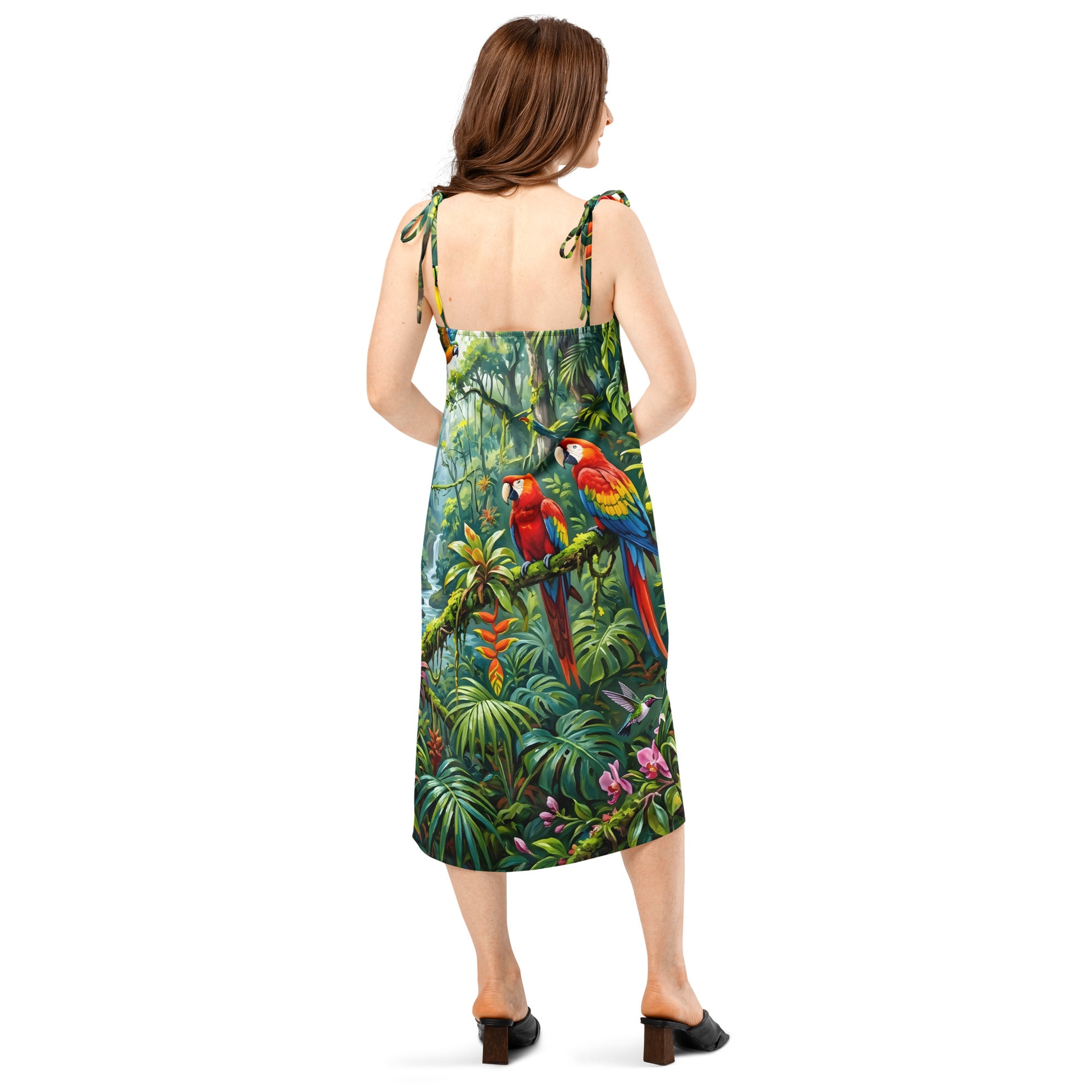 Rainforest Reverie all-over print midi dress showing two scarlet macaws perched in a lush jungle scene with a hummingbird and tropical flowers