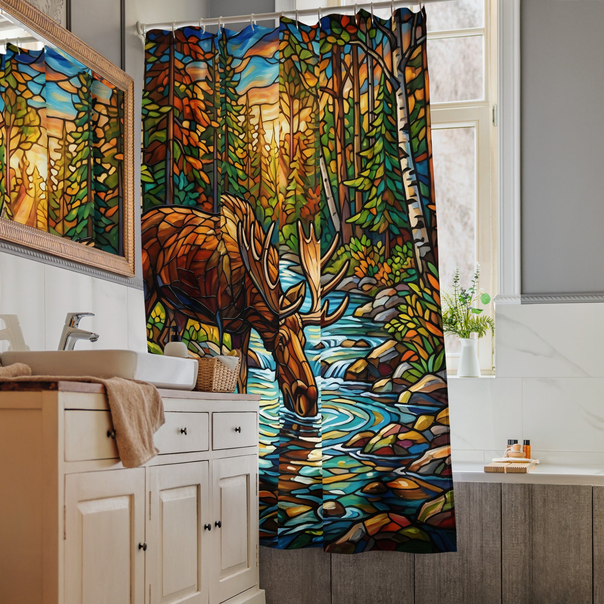 Mosaic Moose Shower Curtain lifestyle shot — close-up of lower portion hanging beside bathtub showing stained glass mosaic design of colorful river rocks rushing stream water and moose legs with birch tree trunks in bright modern bathroom with wood bath tray and toiletries