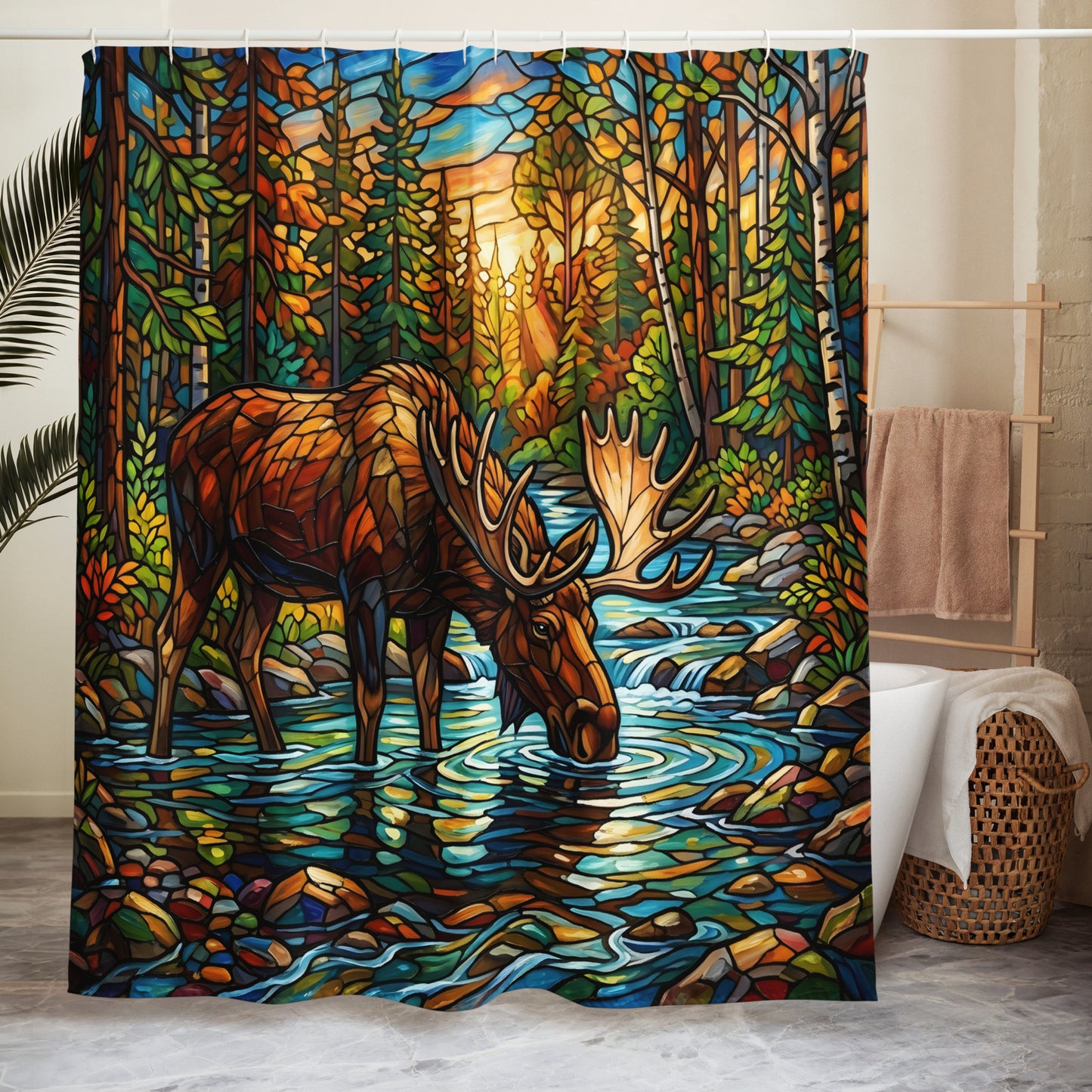 Mosaic Moose Shower Curtain lifestyle shot — 71x74 curtain hanging in bright white bathroom with wood vanity and mirror showing full stained glass mosaic design of bull moose drinking from forest stream surrounded by autumn forest with golden sunset