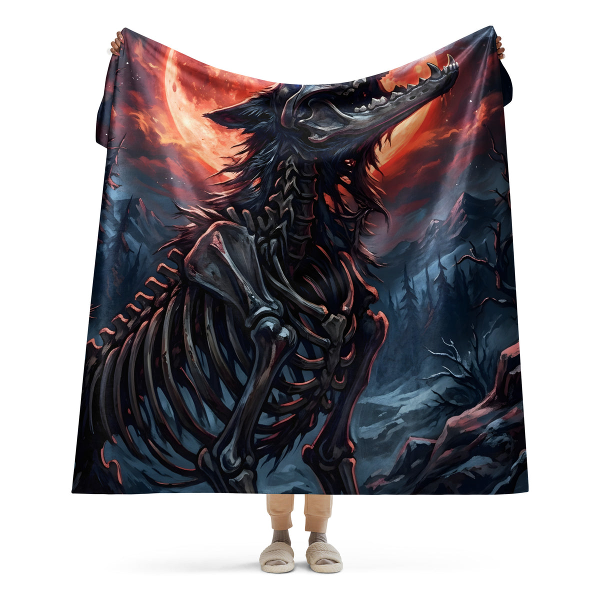 Person holding the 60 × 80-inch Blood Moon Bonewolf blanket open, showing the large skeletal wolf and dark forest artwork beneath a red moon.