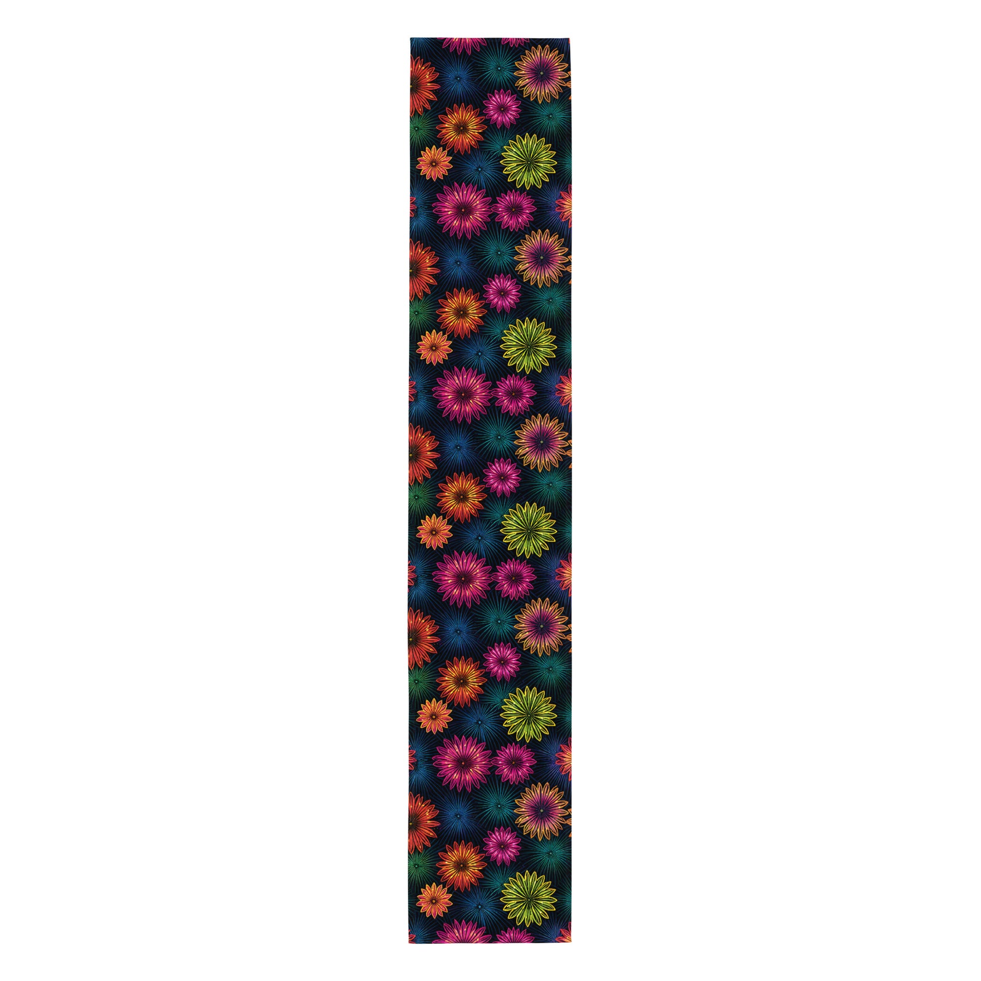 Fluorescent Floral Table Runner product shot — full-length vertical flat lay showing all-over print of neon pink orange yellow-green and teal daisy-like flowers with radiating petal details in scattered arrangement on dark navy background on white background