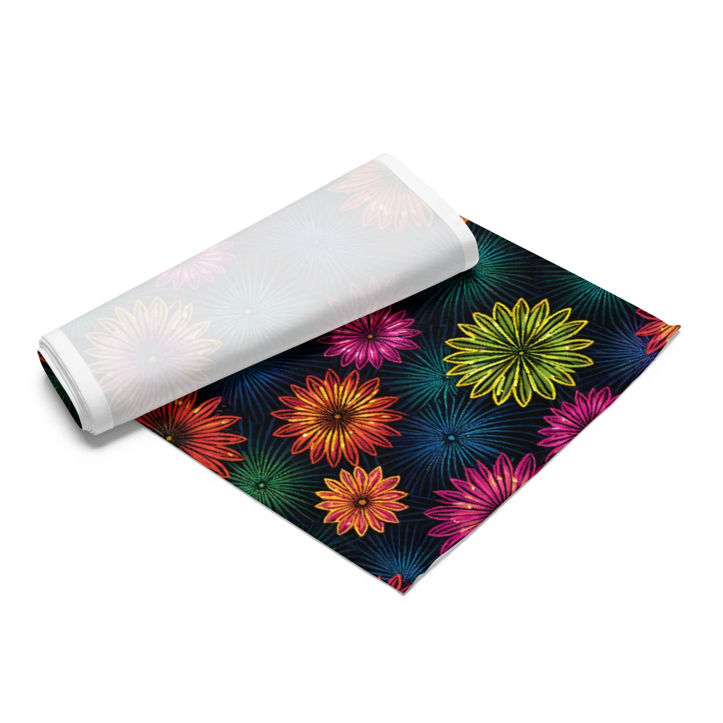Fluorescent Floral Table Runner product shot — table runner diagonal flat lay showing all-over print of neon pink orange yellow-green and teal daisy-like flowers with radiating petal details on dark navy background with white reverse side visible on white background