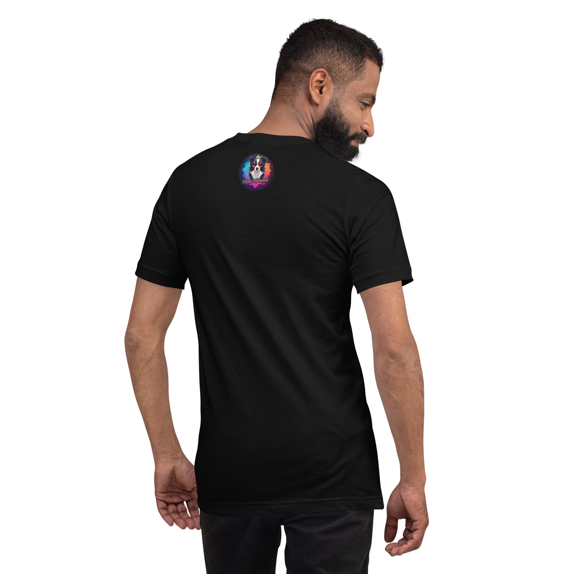 Scout- Happy Howl-o-ween! Unisex T-Shirt lifestyle shot — back view of Middle Eastern male model wearing black tee showing Stylin' & Profilin' border collie logo badge at upper back on white background